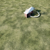 a 3d model of a small house in the middle of a field